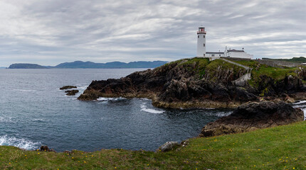 Fototapeta na wymiar panorama landscape view of Fanad Head Lighthouse and Peninsula on the northern coast of Ireland