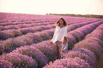 Young woman in white shirt in beautiful Lavender field.