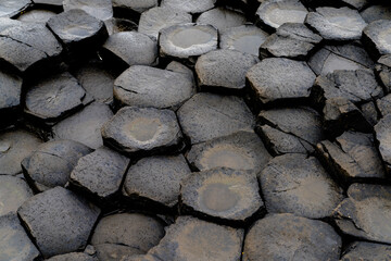 close-up detail view of the volcanic hexagon basalt rock columns of the Giant's Causeway in Northern Ireland
