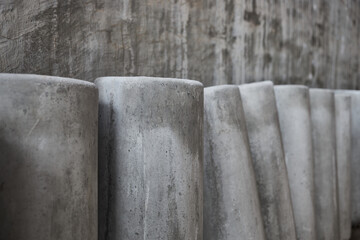 Obraz na płótnie Canvas Row of cylinder concrete pillars standing up
