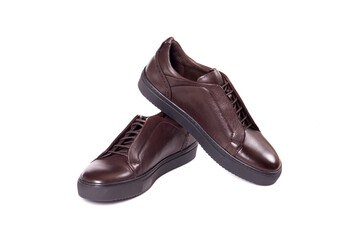 Men's brown leather shoes isolated on white background, with copy space and text.