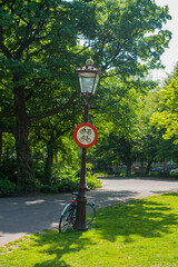 bicycle near the street lamp in the park