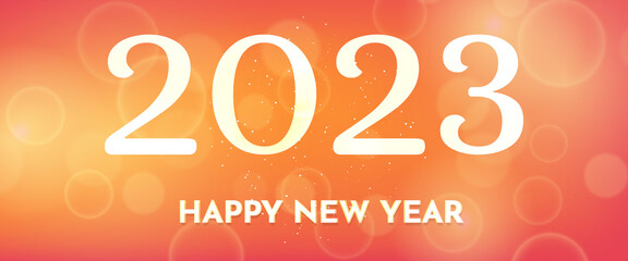 Happy new year 2023 incription on blurred background