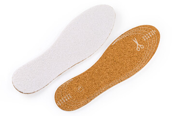 Top view of corkwood and textile insoles of universal size