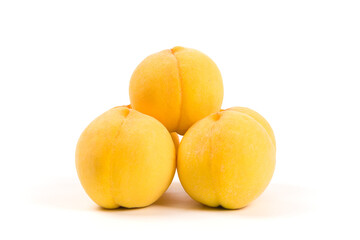 Yellow peach isolated on white background.