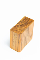 Natural Teak wood cube on white background