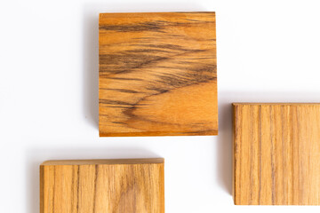 Natural Teak wood cube on white background