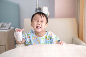 little child playing with blocks