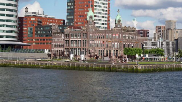 Hotel New York in Rotterdam filmed from the water located on the Kop van Zuid