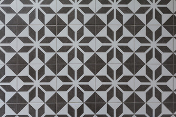 Ceramic decorative tile for kitchen or bathroom. Abstract texture background with geometric traditional pattern.