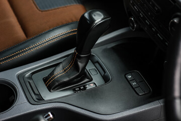 automatic transmission shift selector in the car interior. Closeup a manual shift of modern car...