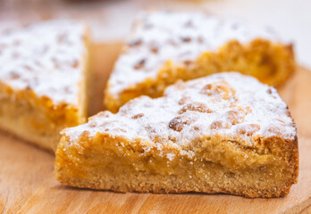 apple pie on wooden desk on white table