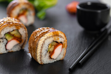 Sushi roll with rice, crab, cucumber. Sushi menu. Japanese food.