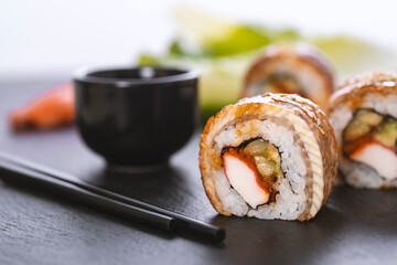 Sushi roll with rice, crab, cucumber. Sushi menu. Japanese food.