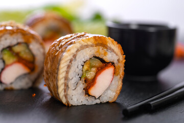 Sushi roll with rice, crab, cucumber. Sushi menu. Japanese food.