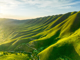 mountains curves and shadows in sunset