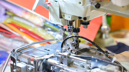 Sewing equipment, loom equipment at a garment factory, industrial concept background