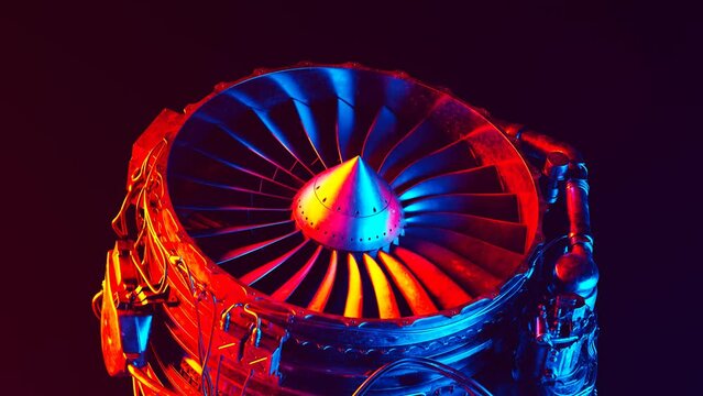 Animation of CFM56 turbofan aircraft engine slowly spinning.  Camera heading.