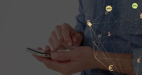 Image of globe with network of connections with digital icons over man using smartphone