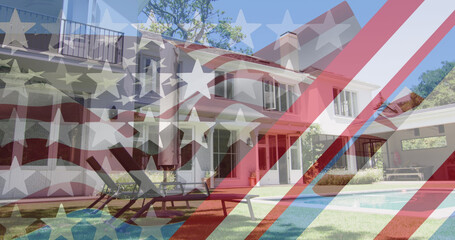 Image of american flag and stars with stripes over house