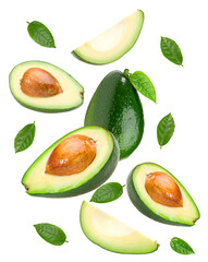 flying avocado with green leaves isolated on white background. clipping path