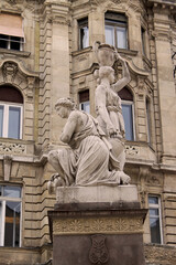 The ancient Nereids fountain on the Ferenciek square in the old town of Budapest, Hungary, Eastern Europe. Nymphs, one with a jar on top of her head, beautiful mythological stone figures.