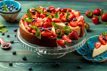 Delicious cheesecake with fresh strawberries for dessert. healthy organic summer berry dessert cheesecake. Homemade cheese cake