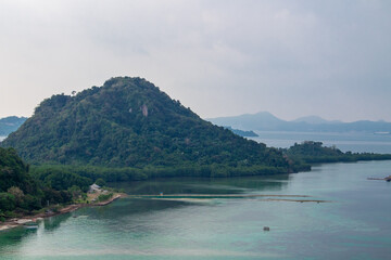 Fototapeta na wymiar Island background surrounded by blue ocean