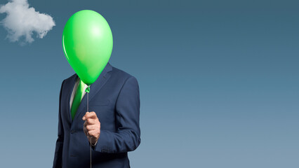 Anonymous businessman with a balloon in front of his head