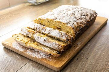 cake with dried fruits on a wooden surface. food concept