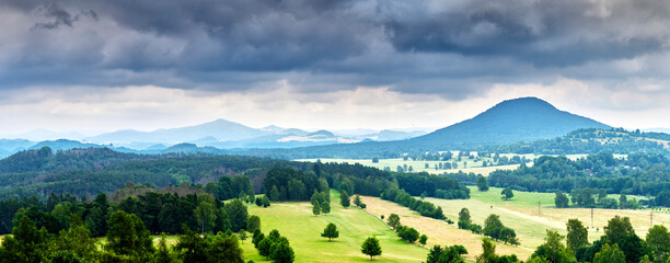 Panorama of hilly and mountainous landscape in Bohemia in Czech Republic