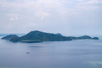 Island background surrounded by blue ocean