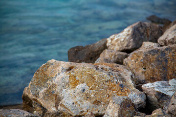 Fototapeta na wymiar Stone texture background on the beach