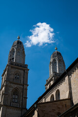 Fototapeta na wymiar The twin towers of Grossmunster church in Zurich city Switzerland. Sunny summer day, no people