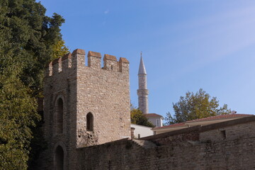 Towers and walls of the old fortress, fortification of the city. On the streets in Istanbul, public...