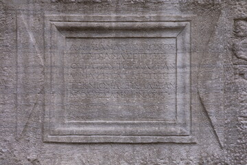 Elements of architectural decorations of buildings, old plaster sculptures and bas-reliefs, wall texture and patterns. On the streets in Istanbul, public places.