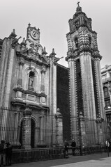 Interesting historic buildings in black and white on 5th Avenue in the historic centre near Zocalo Square -pedestrain streets in Mexico City, Mexico.