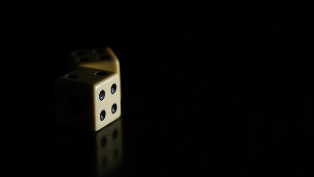 Very close up shot of dice in stationary position, not moving or being touched.