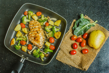 grilled chicken with vegetables and herbs