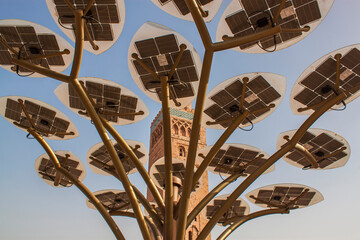Solar cells, Koutoubia Mosque tower in downtown Marrakesh, Morocco, Africa. Eco, alternative...