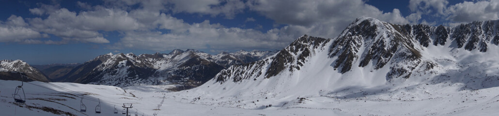 Fototapeta na wymiar panoramic view of snow covered mountains in france
