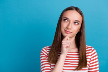 Photo of amazing lady looking up empty space deep thinking creative person isolated blue color background