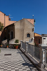 Fototapeta na wymiar Small terrace in the italian town.
