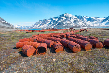 Fototapeta premium An abandoned US military base litters - Thousands of oil drums scattered across the land, Greenland