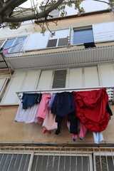 Laundry drying on the street in a big city