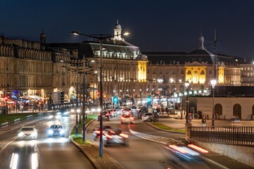 Fototapeta premium The city traffic at night in Bordeaux France