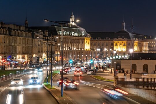 The city traffic at night in Bordeaux France