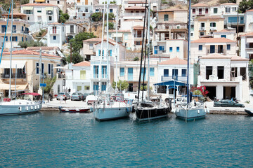 Fototapeta na wymiar Beautiful view of coastal city with boats on sunny day