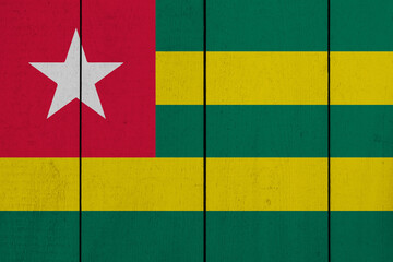 Patriotic wooden plank background in colors of flag. Togo