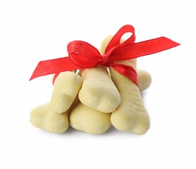 Bone shaped dog cookies with red bow on white background